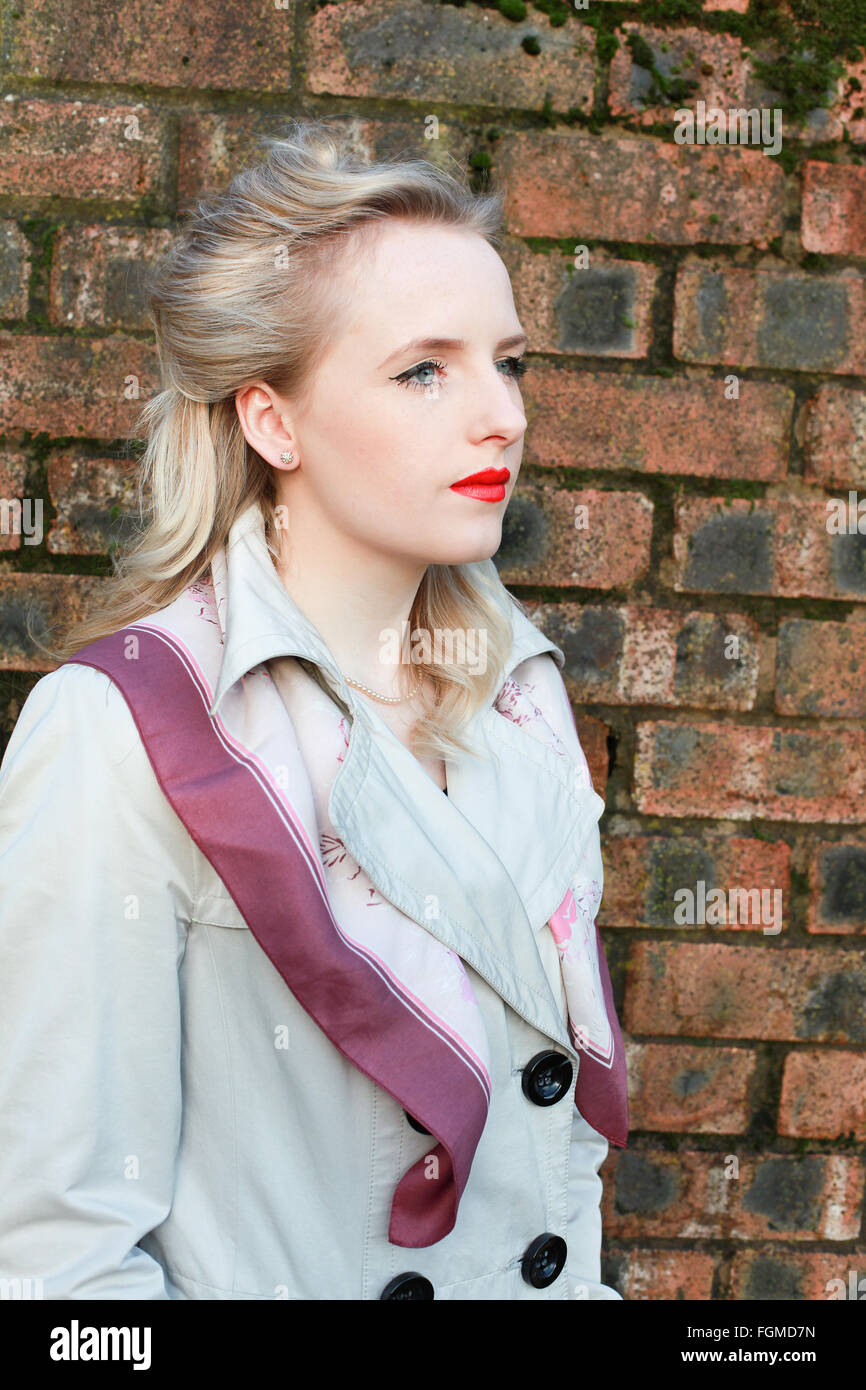 Young woman from the forties era looking into the distance Stock Photo