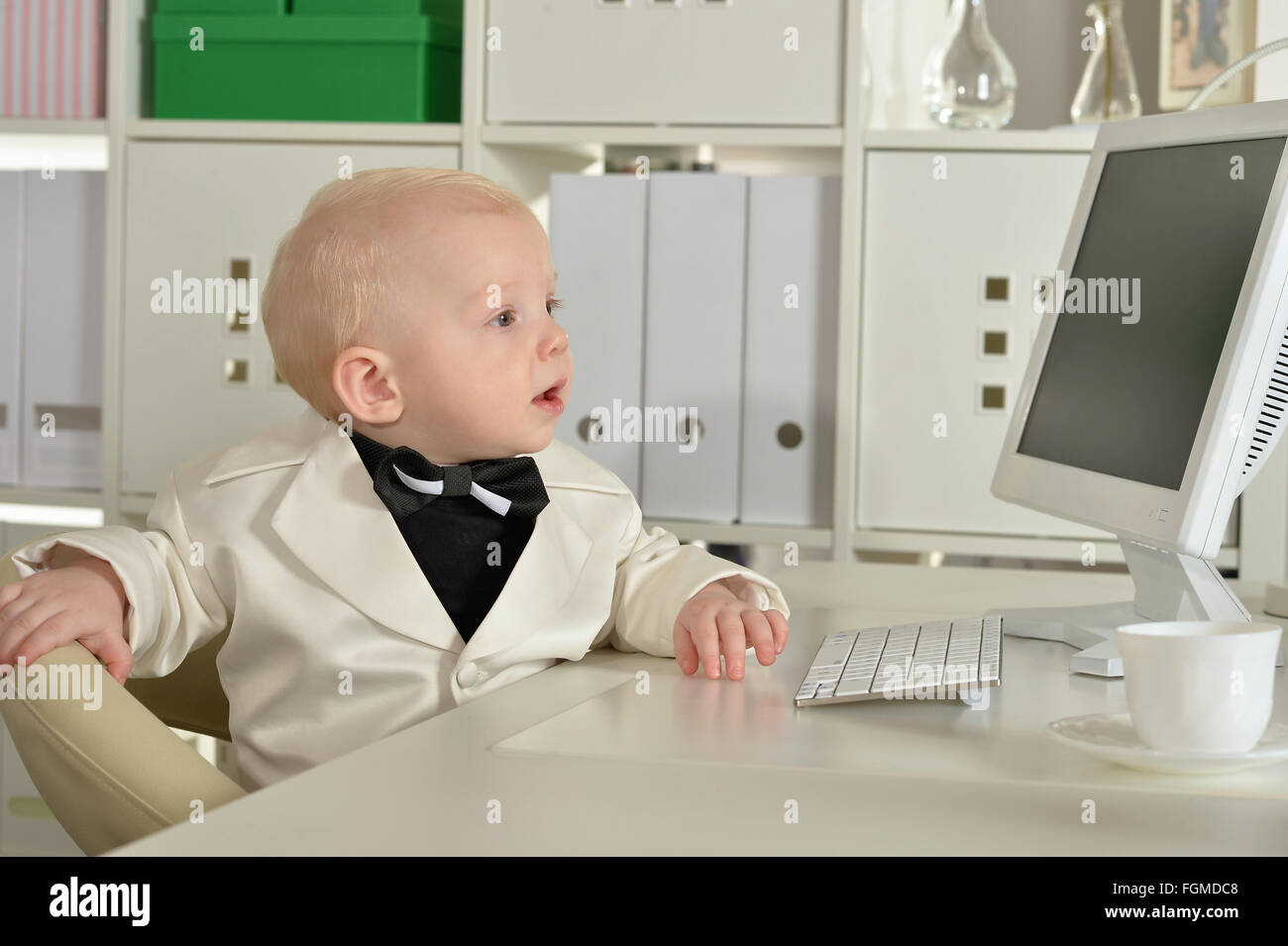 Small business boy and computer Stock Photo - Alamy