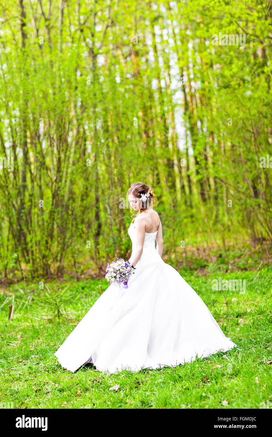 Wedding. Beautiful bride with bouquet Stock Photo - Alamy