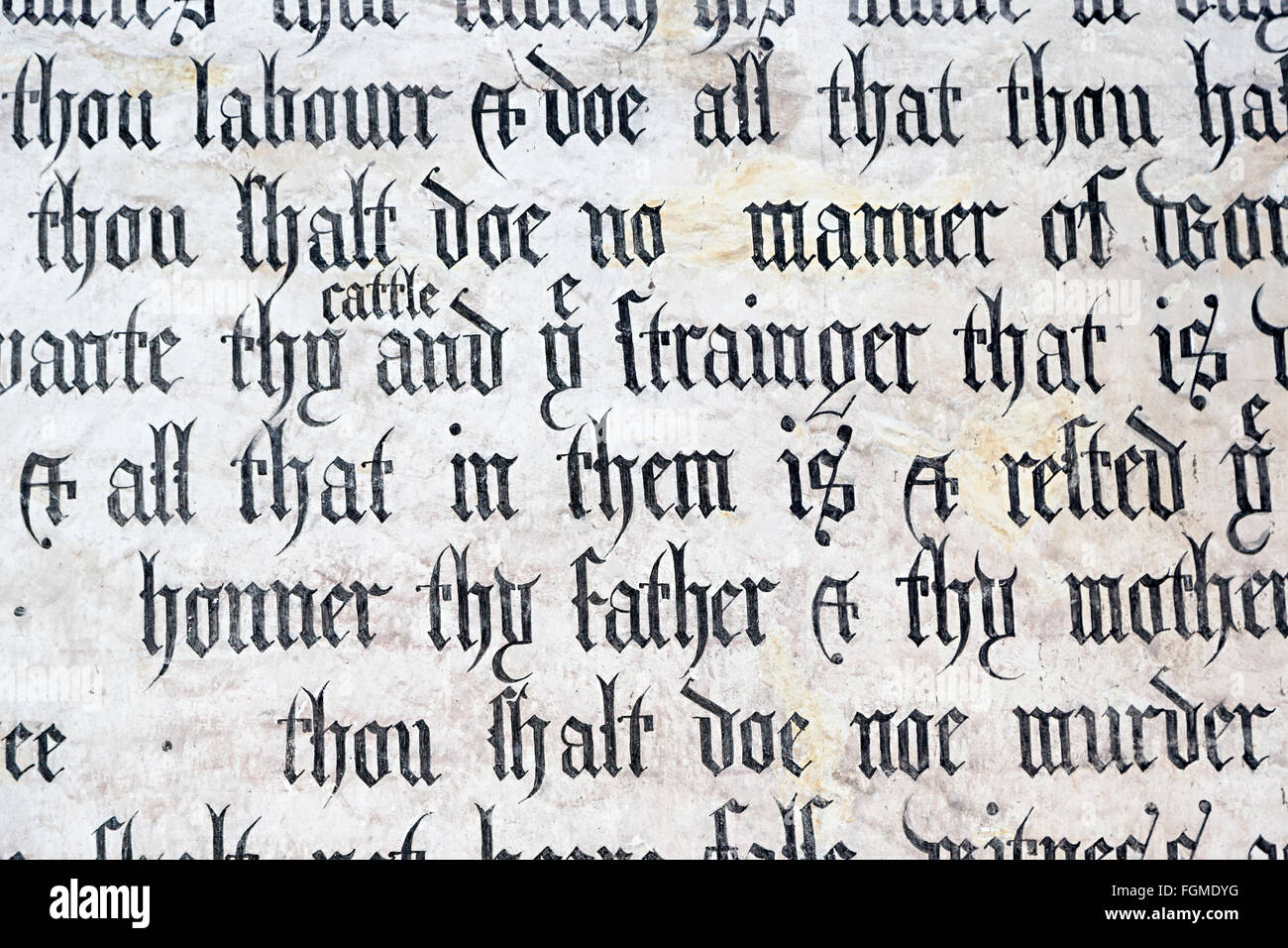 Detail of instructional religious text painted on the wall of Partrishow church of St Islow or Issui, near Abergavenny, Wales, U Stock Photo