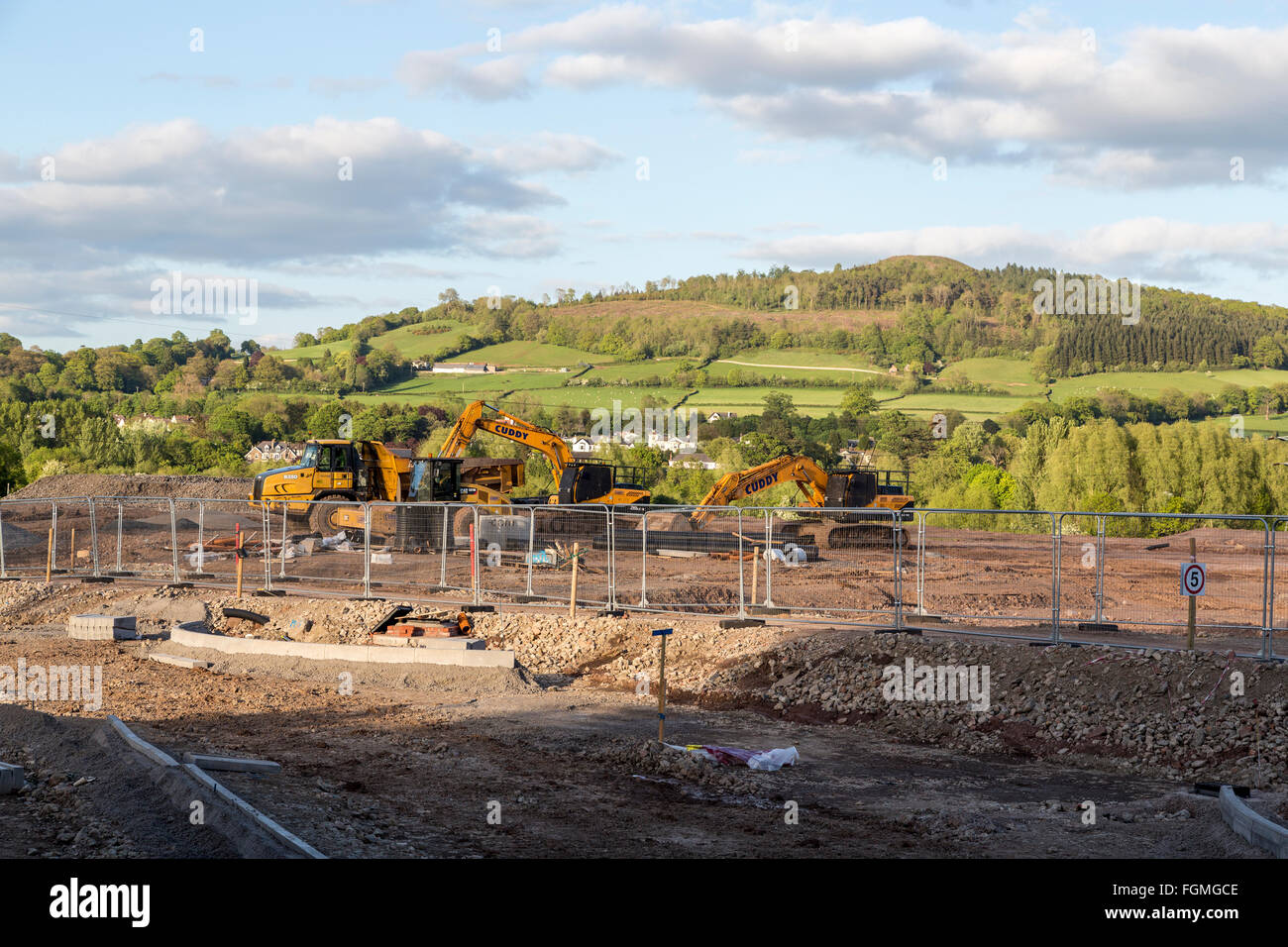 Clearing ground for new housing estate and road system, Llanfoist, Wales, UK Stock Photo