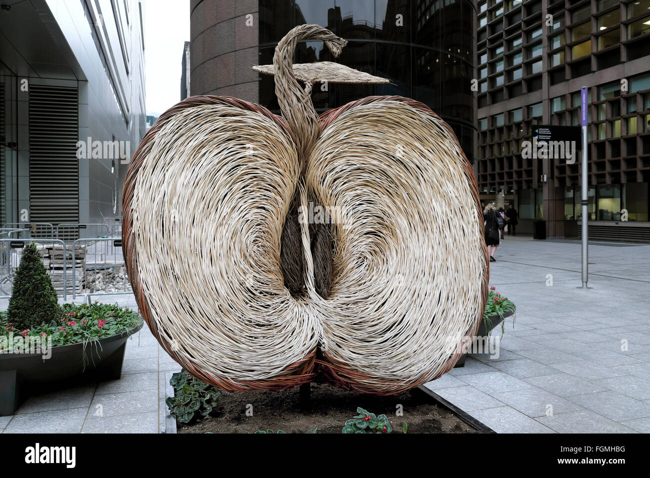 Apple woven willow sculpture by artist Tom Hare at the Broadgate Centre in the Square Mile City of London England UK   KATHY DEWITT Stock Photo