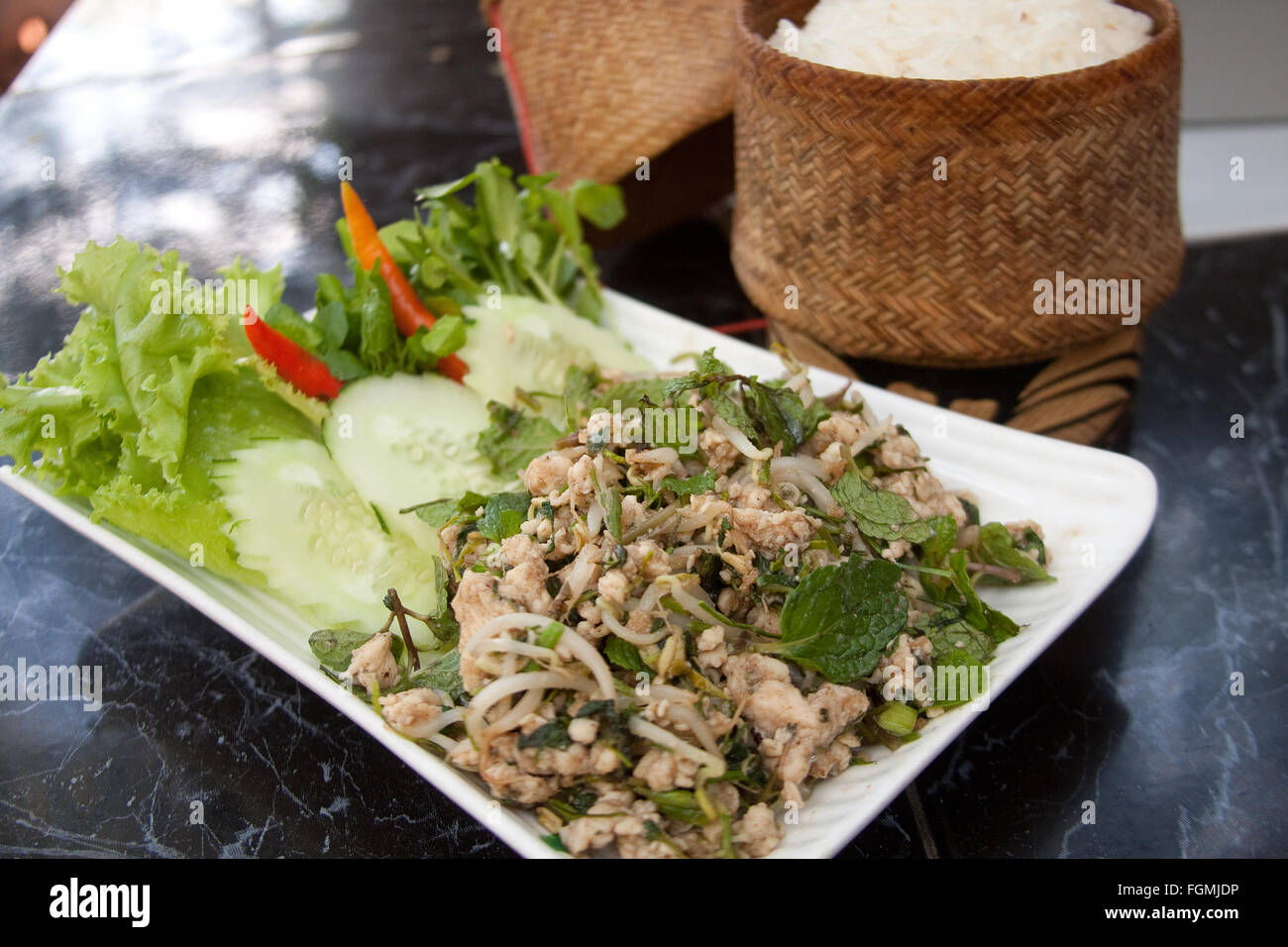 Laap, chicken salad Lao style served in Luang Prabang Stock Photo