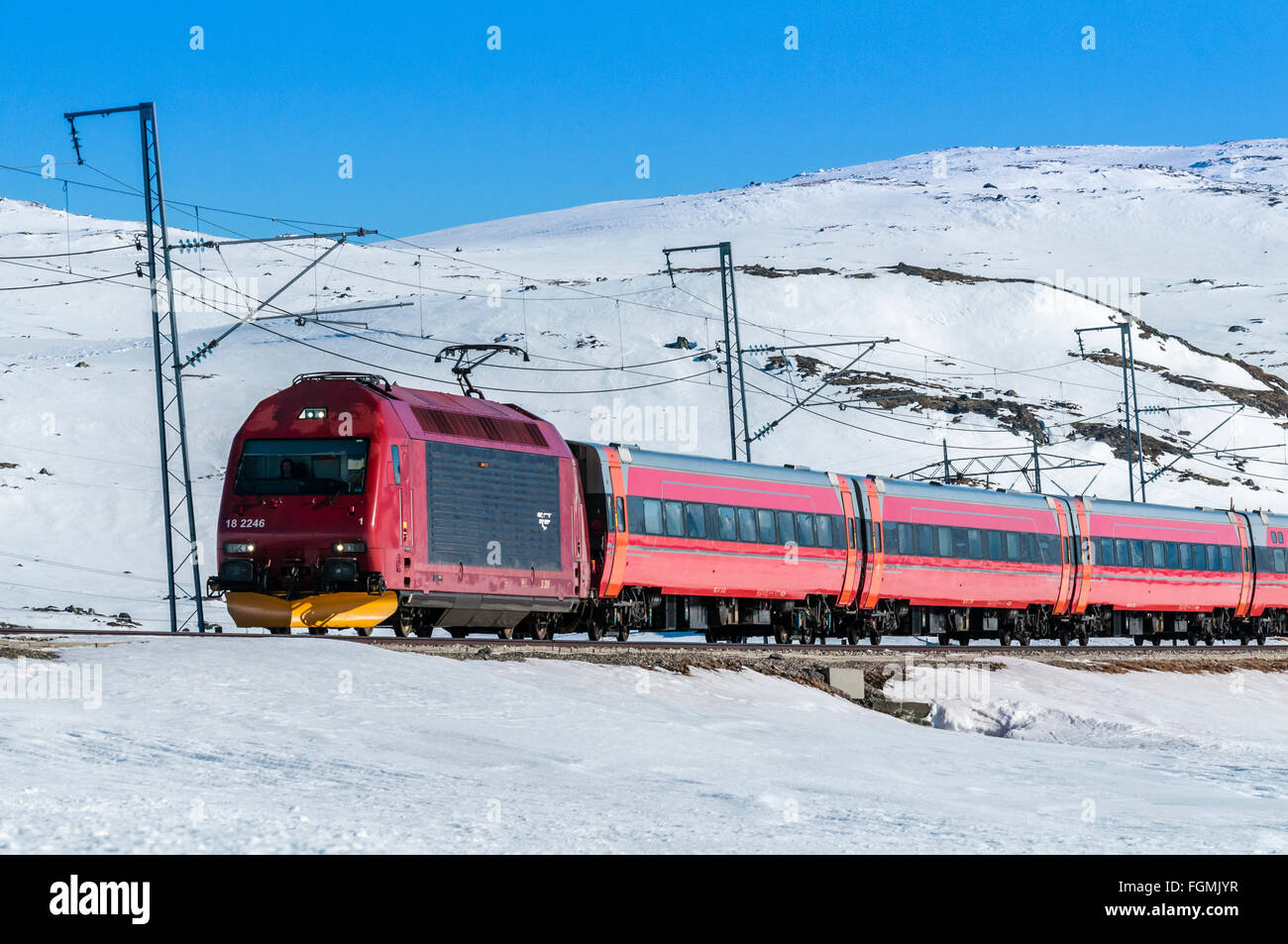 Long distance train Oslo-Bergen, east of Finse, Hardangervidda plateau , winter, Hordaland, Norway Stock Photo