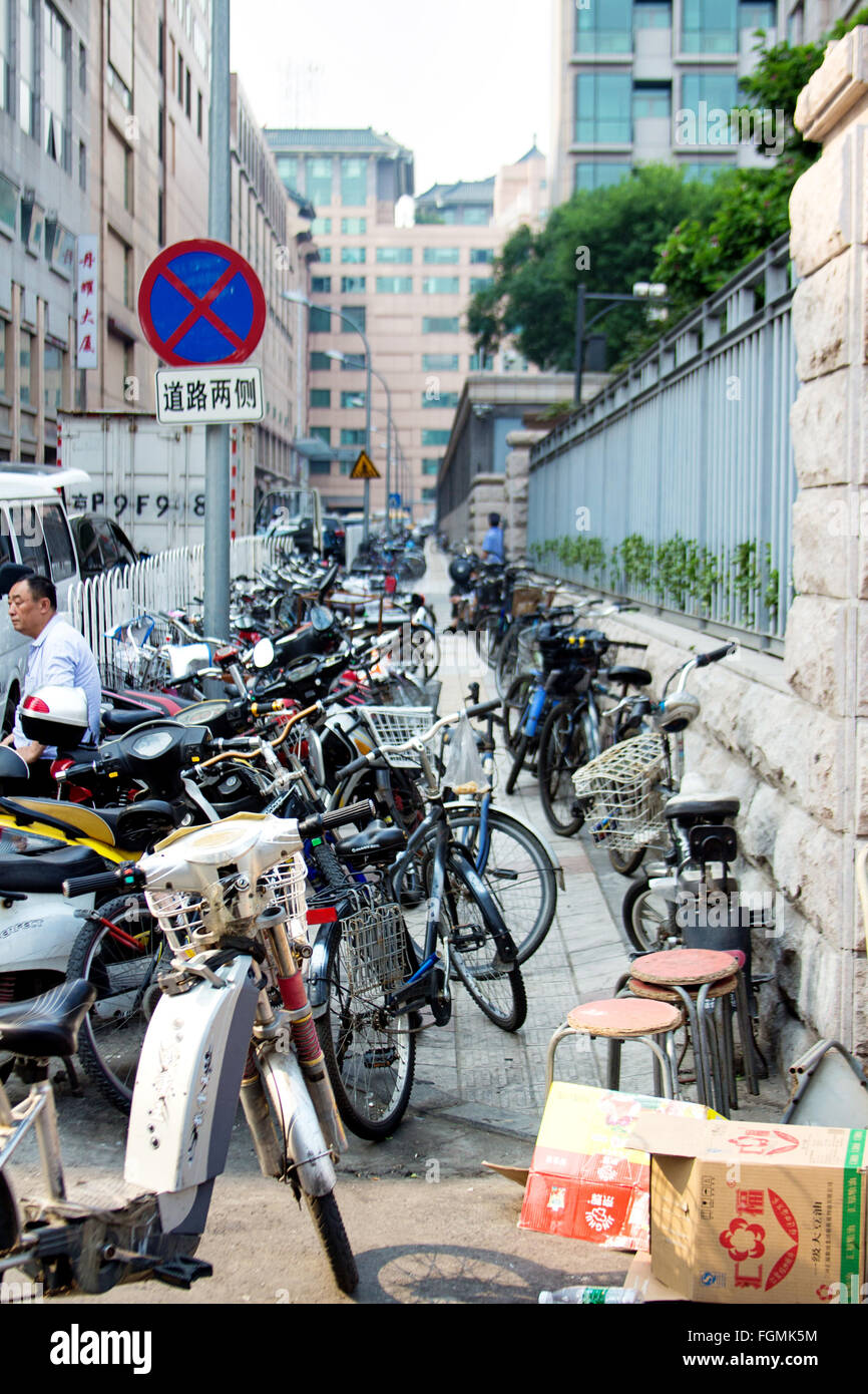Row of parked bicycles in Beijing Stock Photo