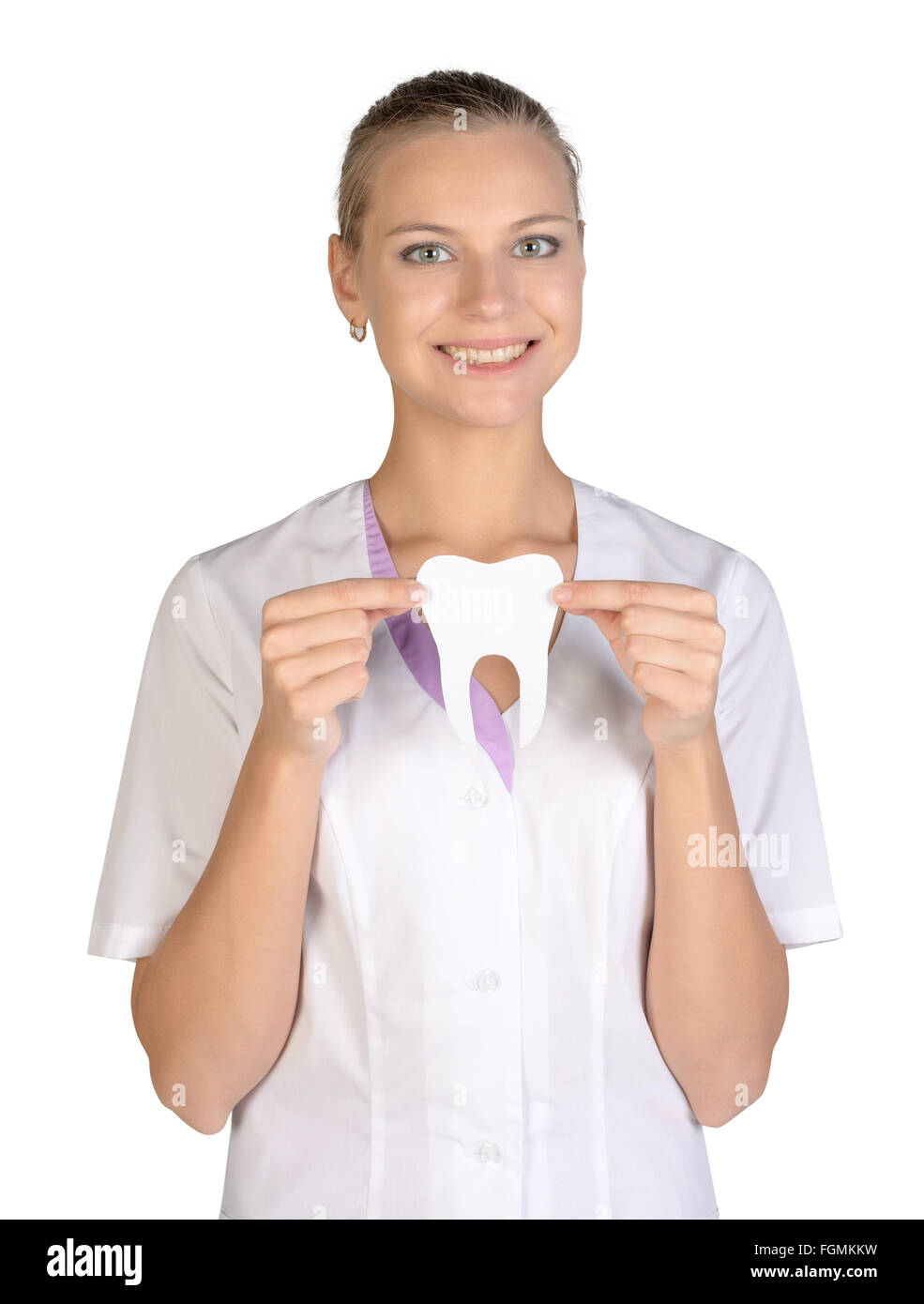 Smiling woman dentist holding a white paper tooth Stock Photo Alamy