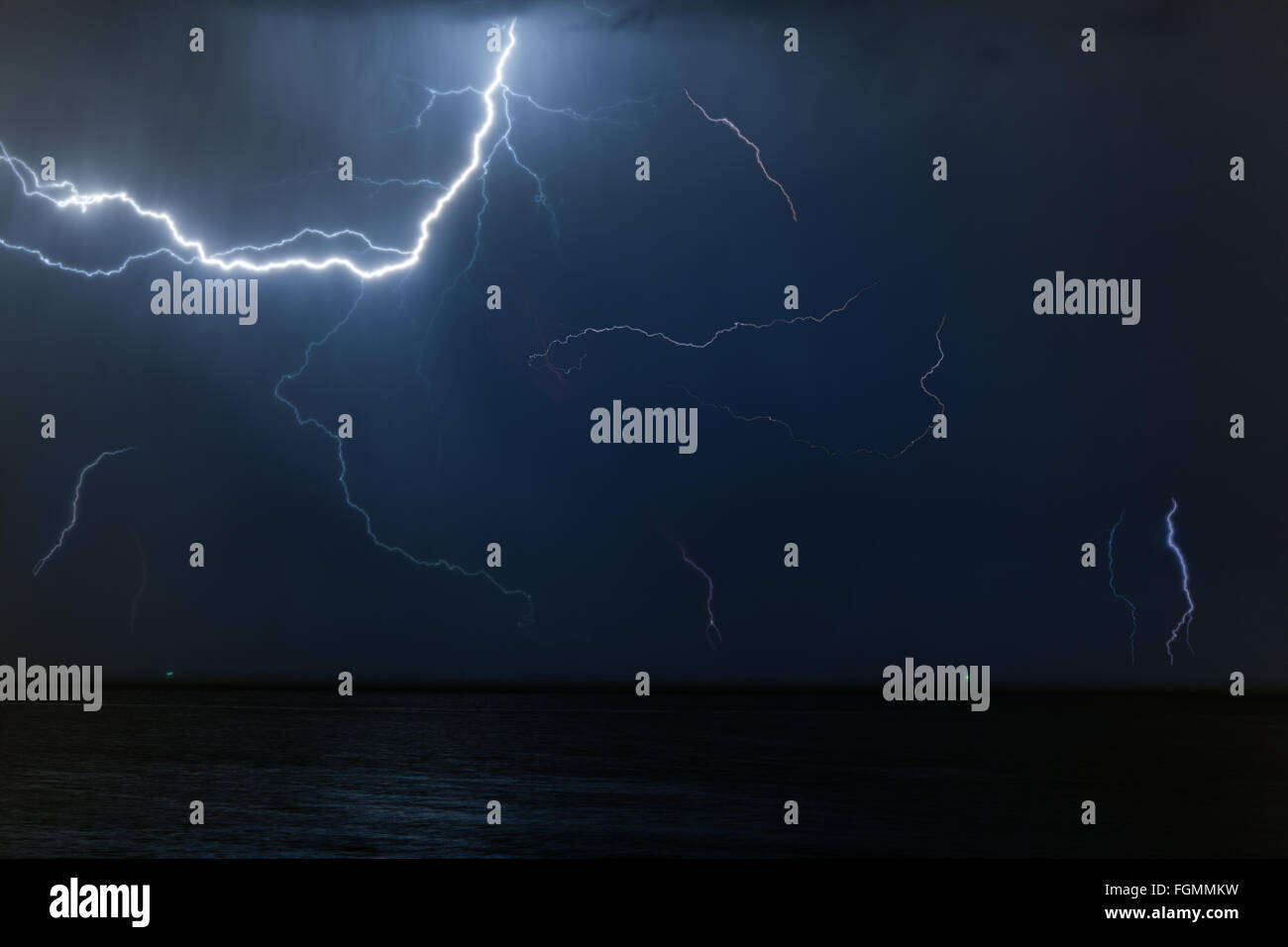 Bolt of lightening in a night sky Stock Photo - Alamy