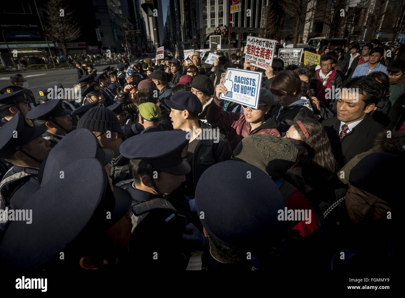 The police blocks the antagonist group protesting against the demo for their discrimination toward Koreans during the protests of nationalists in Shinjuku to sue the severance of diplomatic relations between Japan and South Korea and Takeshima to regain from South Korea. The Liancourt Rocks, also known as Dokdo in Korean or Tokyo, and Takeshima in Japanese, are a group of small islets in the Sea of Japan. While South Korea controls the islets, its sovereignty over them is Contested by Japan. The Liancourt Rocks or Takeshima lie in rich fishing grounds Which may Contain large deposits of natura Stock Photo