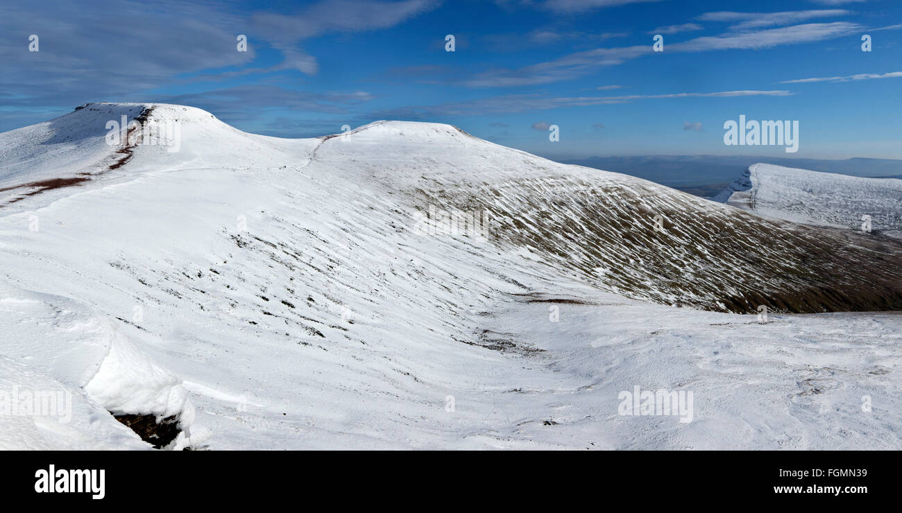 Corn Du, Pen y Fan and Cribyn, the three central peaks of the Brecon Beacons, covered in snow, winter. Stock Photo