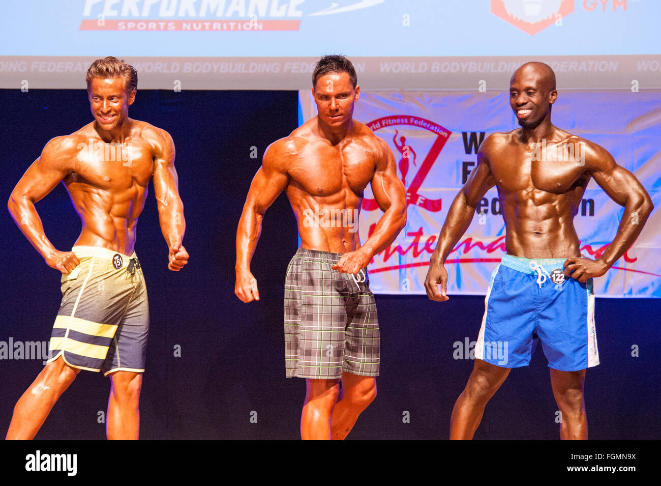 MAASTRICHT, THE NETHERLANDS - OCTOBER 25, 2015: Male physique model John Black and other competitiors show their best front pose Stock Photo