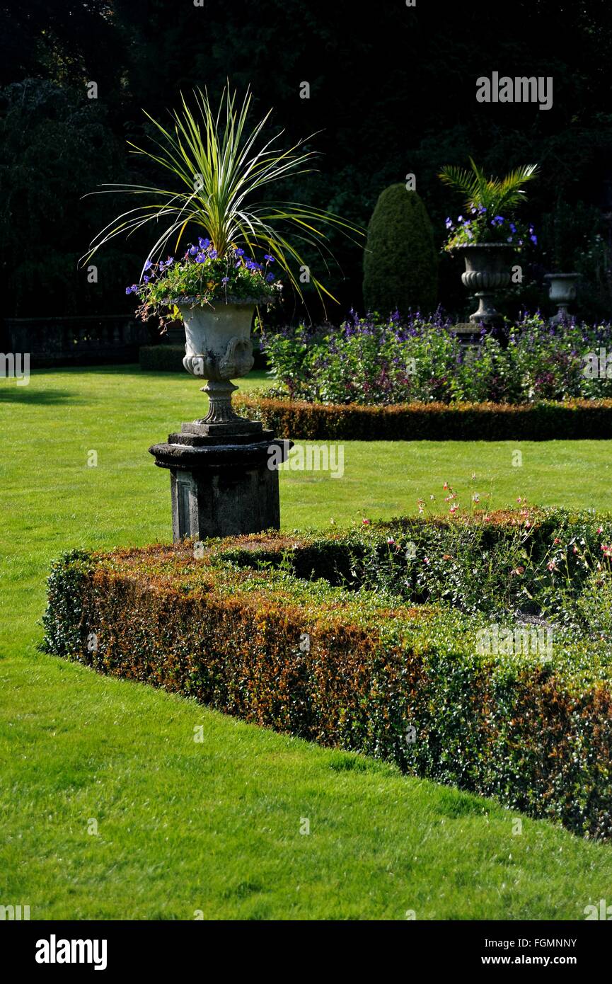 Rydal Hall, Rydal Village, Ambleside, Lake District National Park, Cumbria, England, UK. Formal gardens, Lawns, Garden Urns, Stock Photo