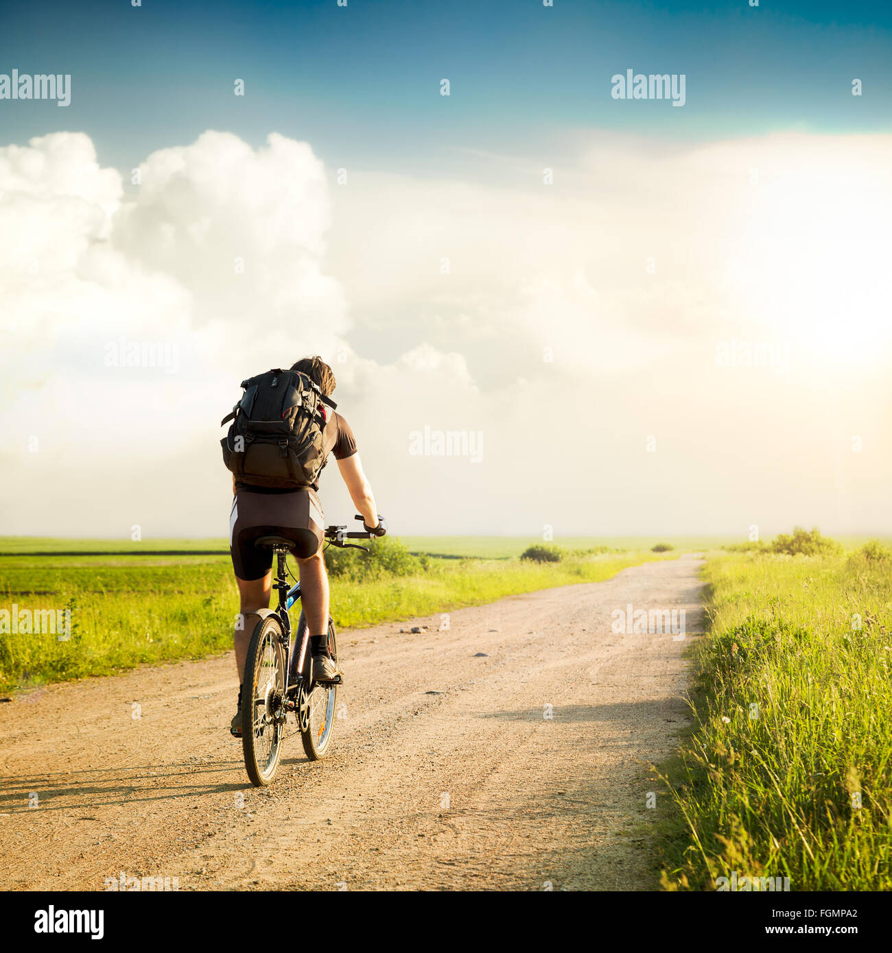 Backpack Riding Position Lifestyle man backpack riding hi-res stock photography and images - Alamy