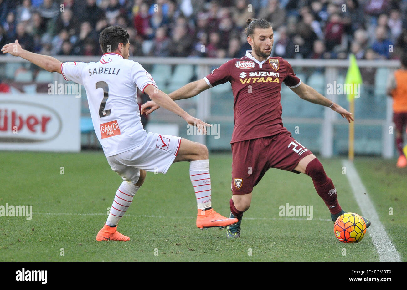 Turin, Italy. 21st Feb, 2016. Stefano Sabelli (left) and Gaston Silva (right) fight for the ball during the Serie A football match between Torino FC and Carpi FC. The final result of the match is 0-0 © Nicolò Campo/Pacific Press/Alamy Live News Stock Photo