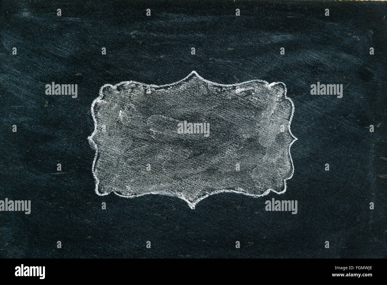 Hand drawing chalk frame filled with white on blackboard as design ...