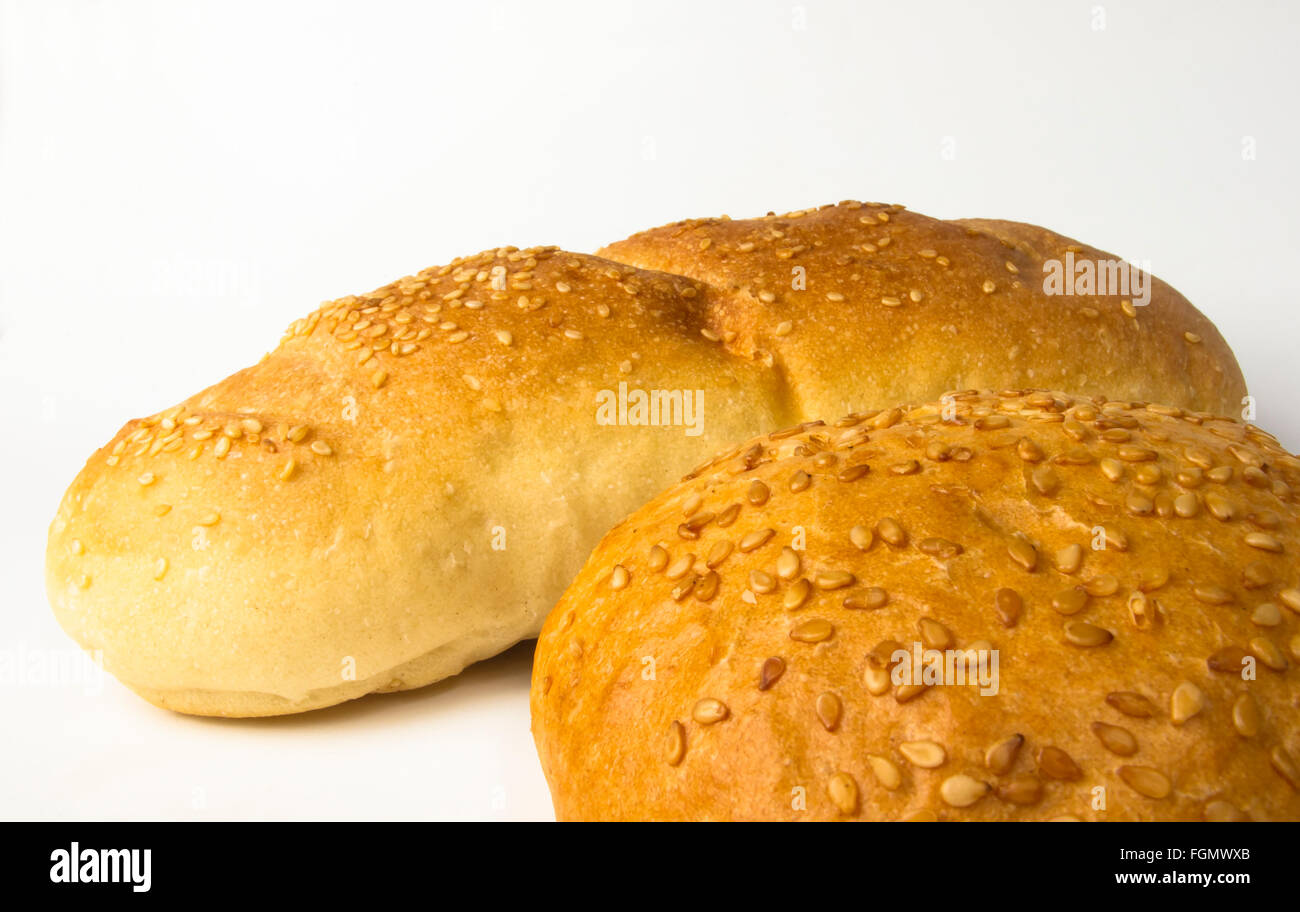 whole wheat breads and bun on white background Stock Photo - Alamy