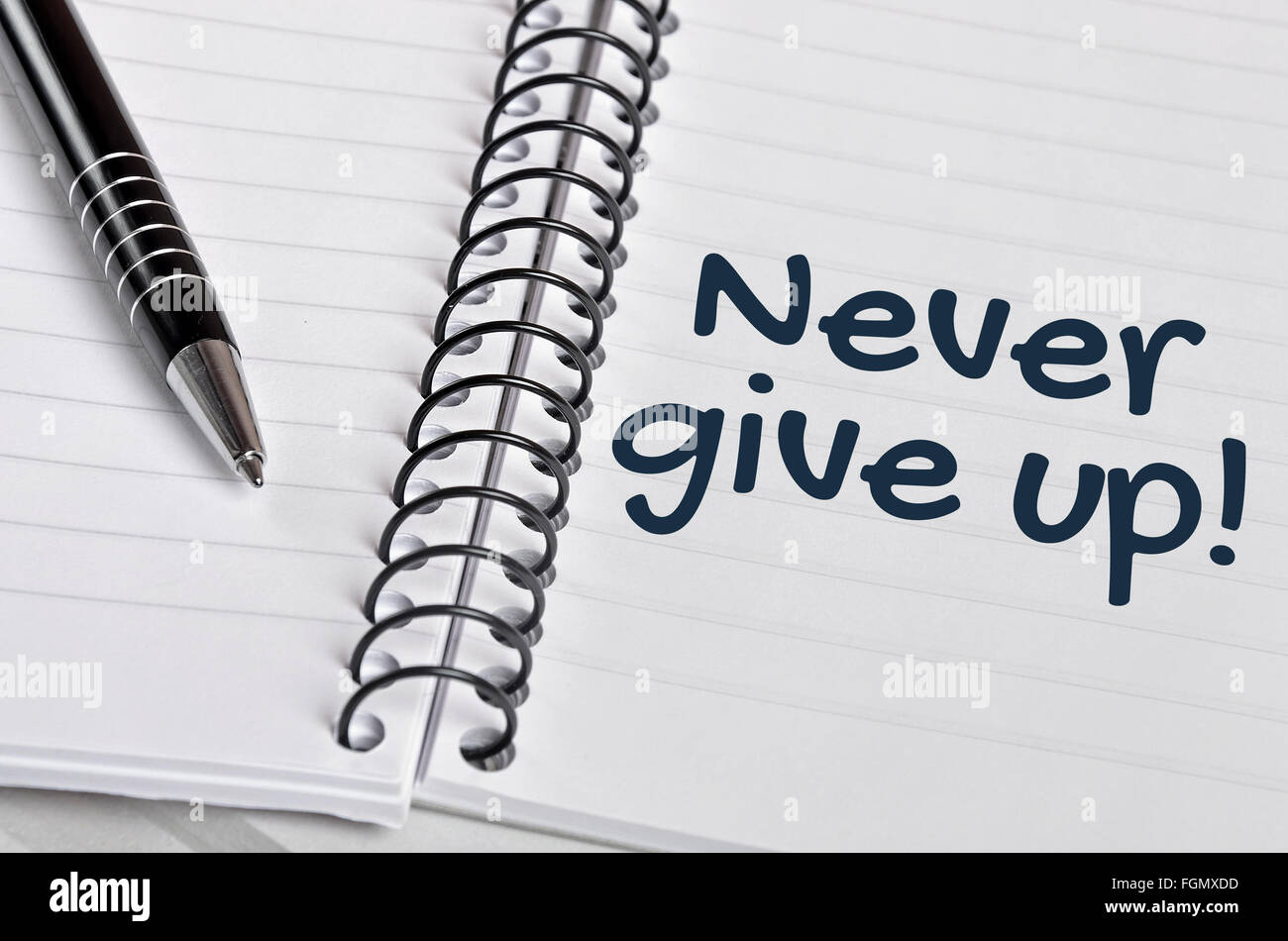 Never give up word on notebook page Stock Photo Alamy