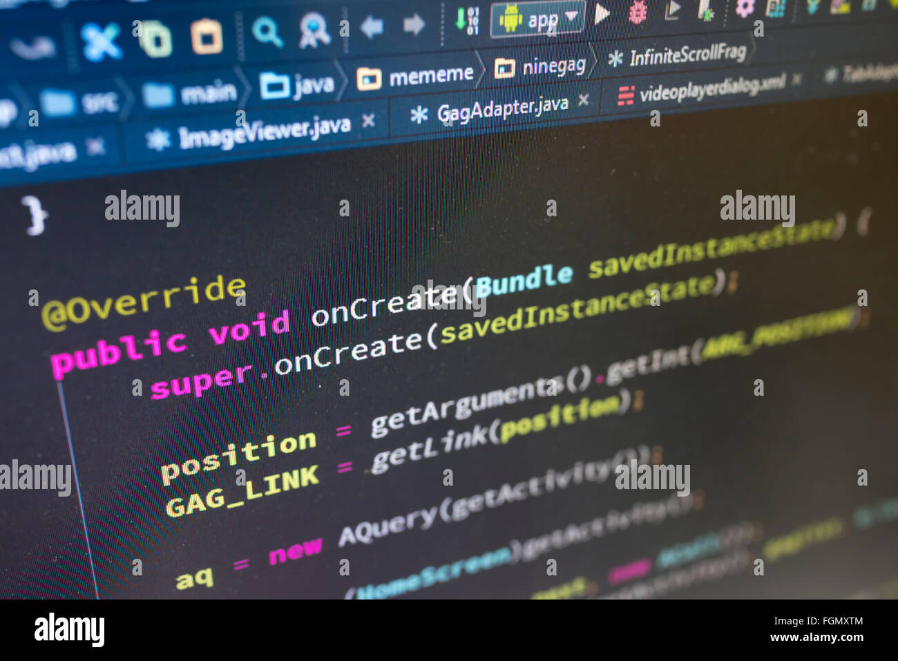 Coding on screen with colorful code Stock Photo - Alamy