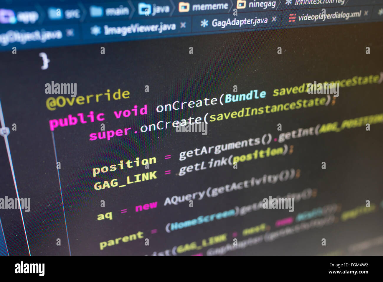 Coding on screen with colorful code Stock Photo - Alamy
