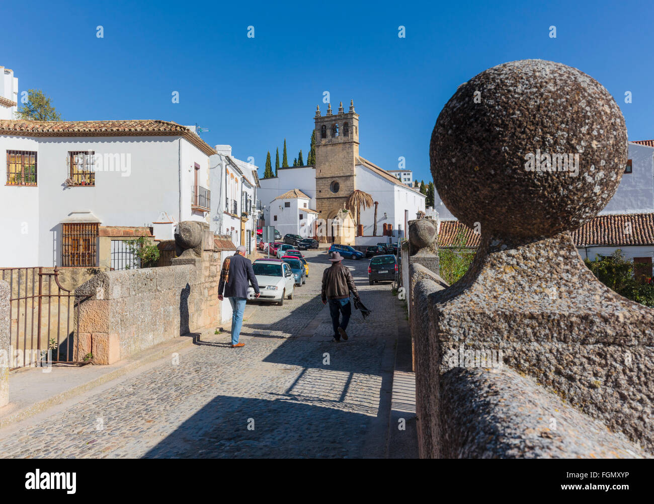 Ronda, Malaga Province, Andalusia, southern Spain. Crososing the Puente Viejo, or Old Bridge. Stock Photo