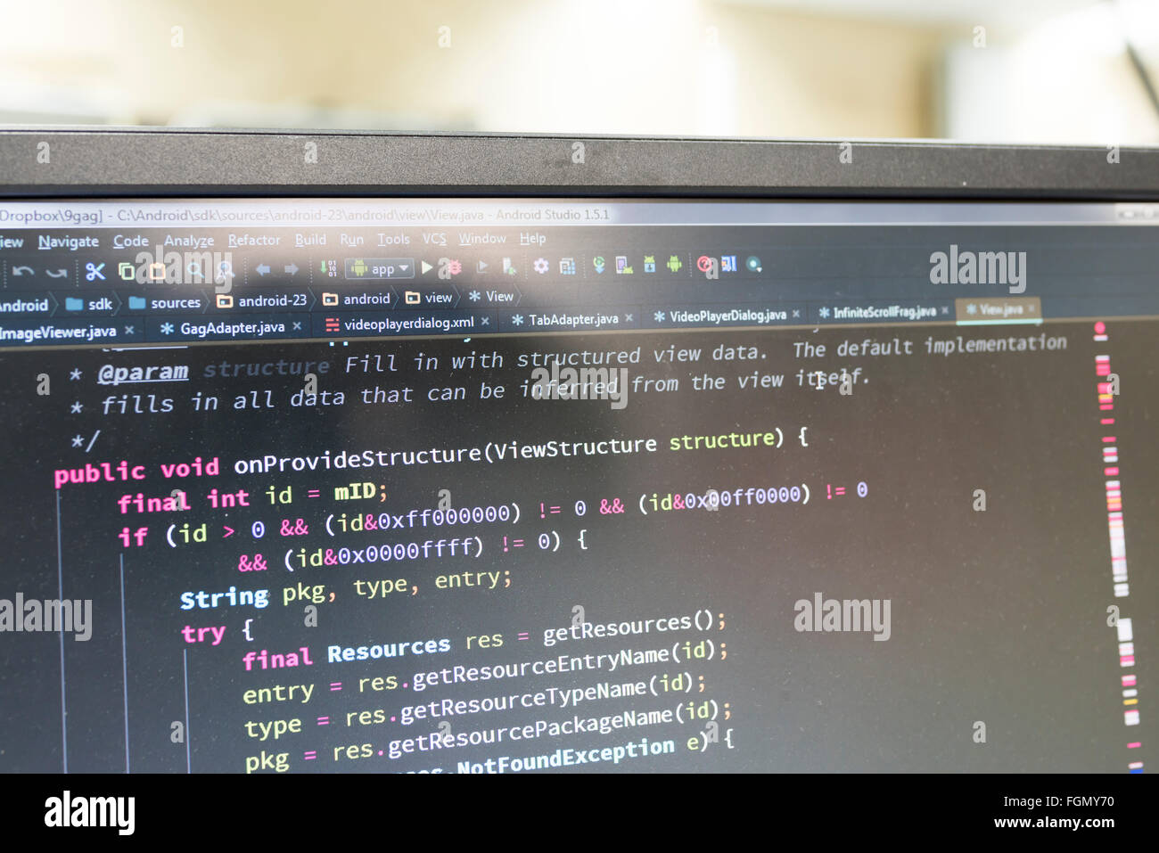 Coding on screen with colorful code Stock Photo - Alamy