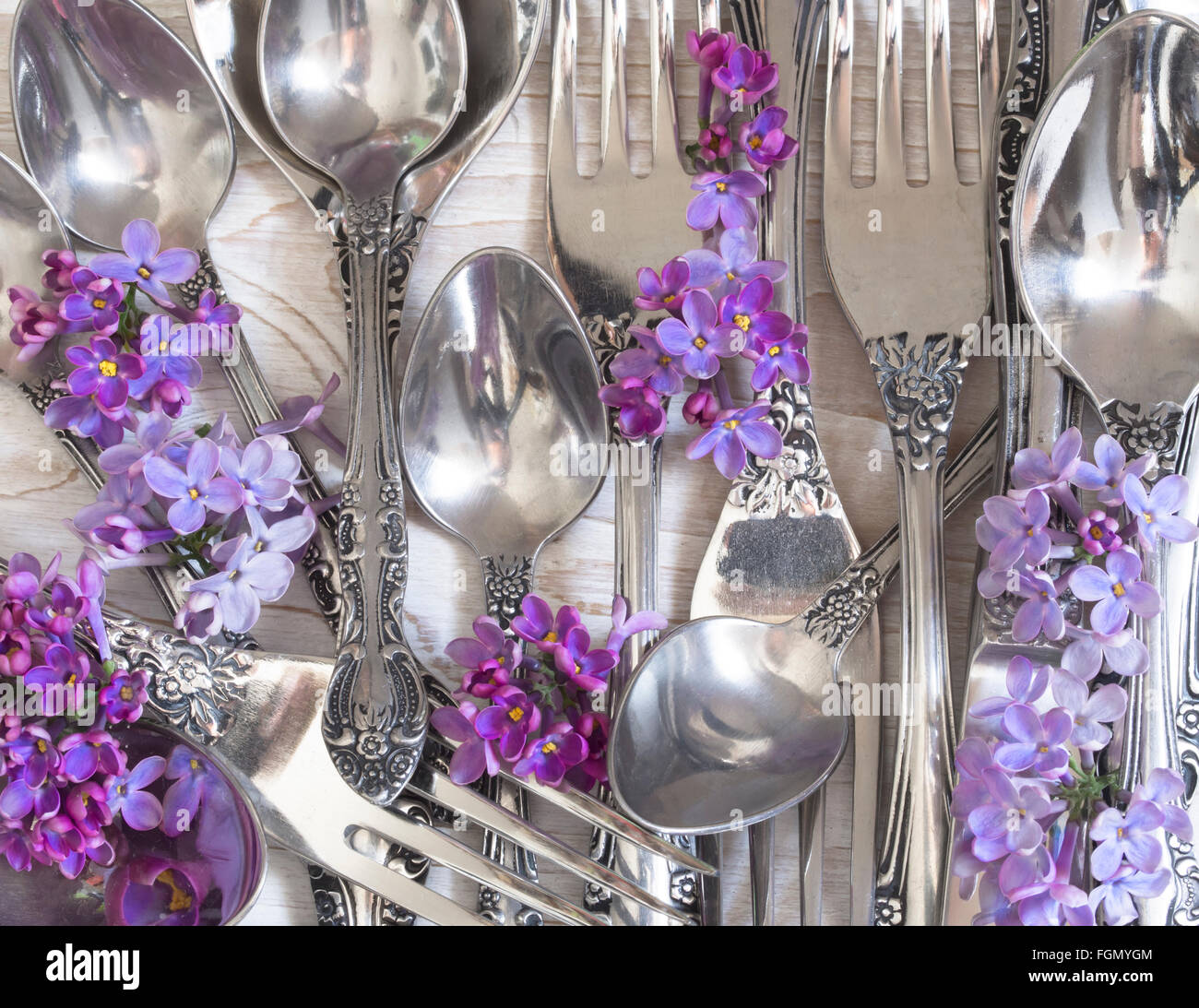 utensils in the floral arrangement Stock Photo Alamy