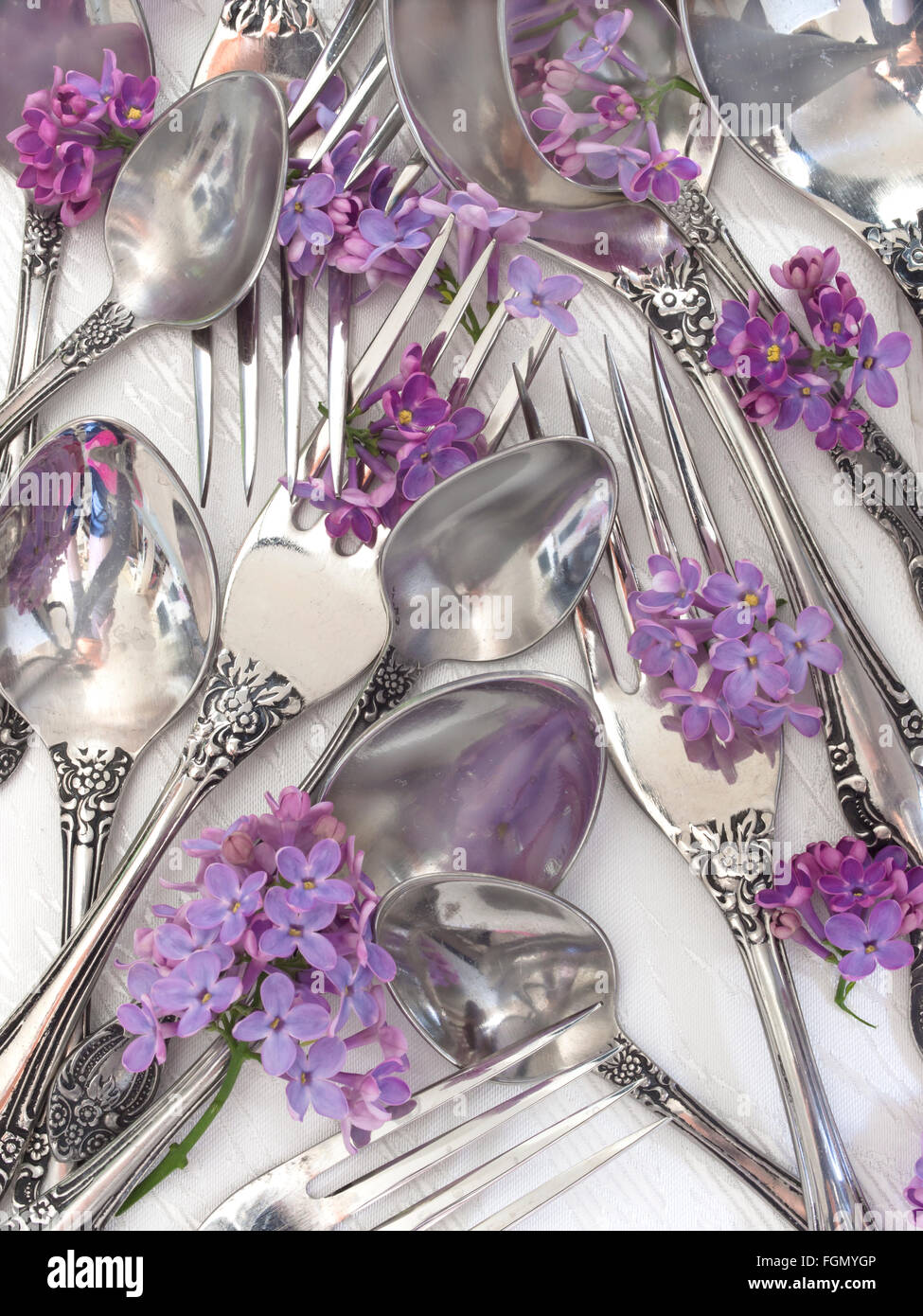 utensils in the floral arrangement Stock Photo Alamy
