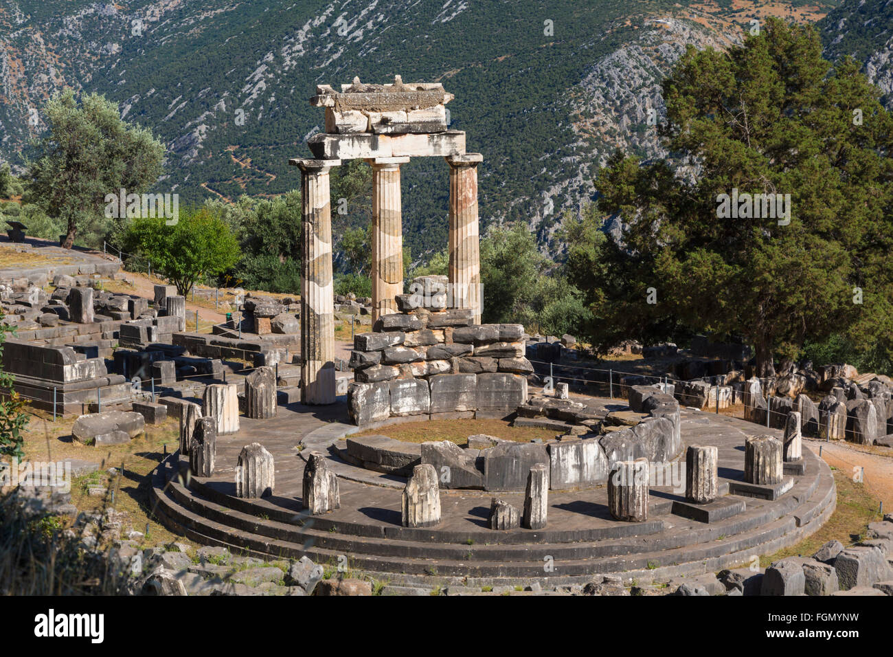 Delphi, Phocis, Greece.  The tholos, dating from around 380-360 BC, beside the Sanctuary of Athena Pronaia. Stock Photo