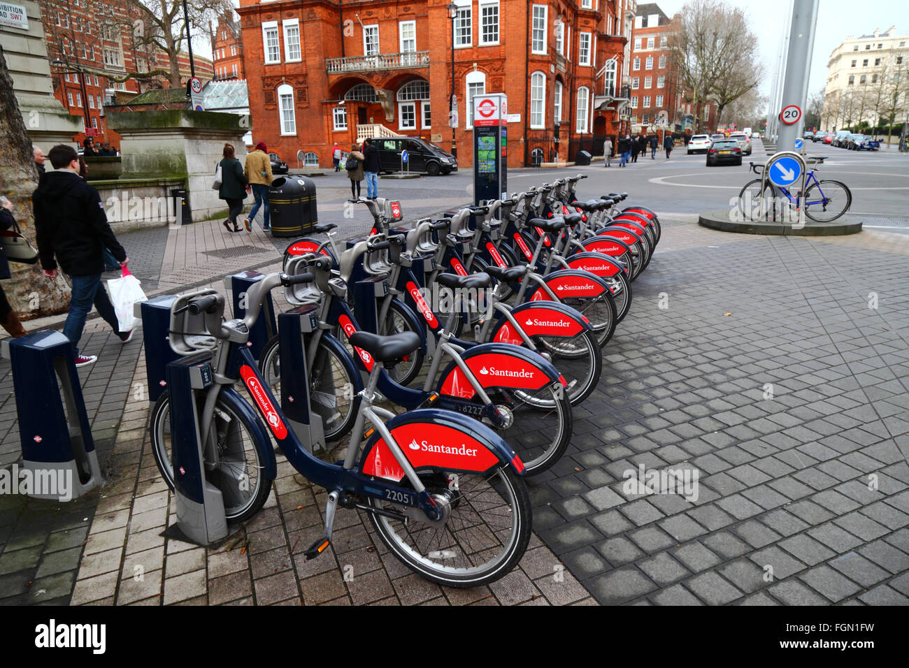 Santander Cycles hire bicycles at a docking station in Exhibition Road, Kensington, London, England Stock Photo