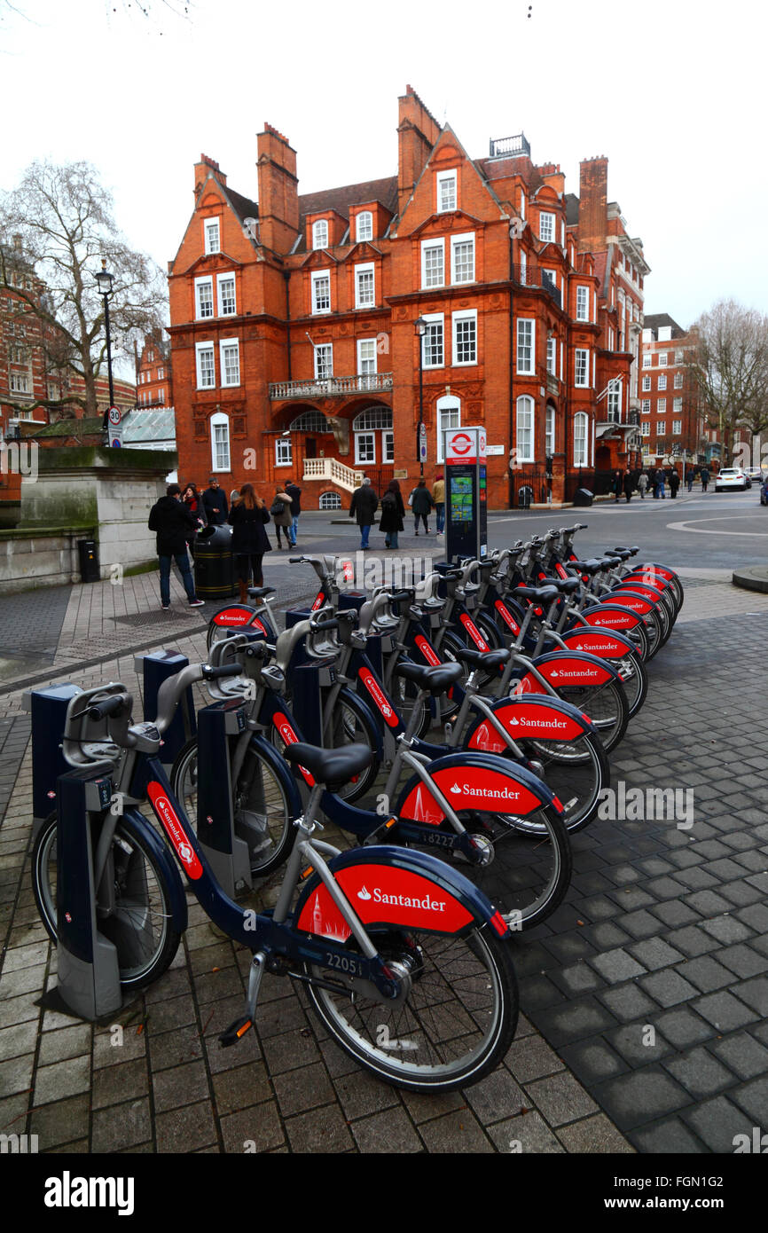 Santander Cycles hire bicycles at a docking station in Exhibition Road