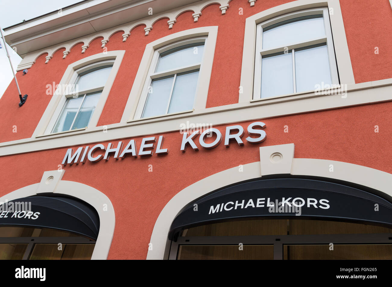 Roermond, Netherlands - July 14, 2015: Exterior of a Michael Kors shop at  the Roermond Designers Outlet. Michael Kors is a New Y Stock Photo - Alamy