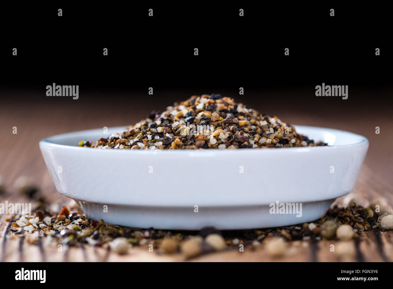 Crushed Peppercorns with different spices and salt (closeup shot Stock