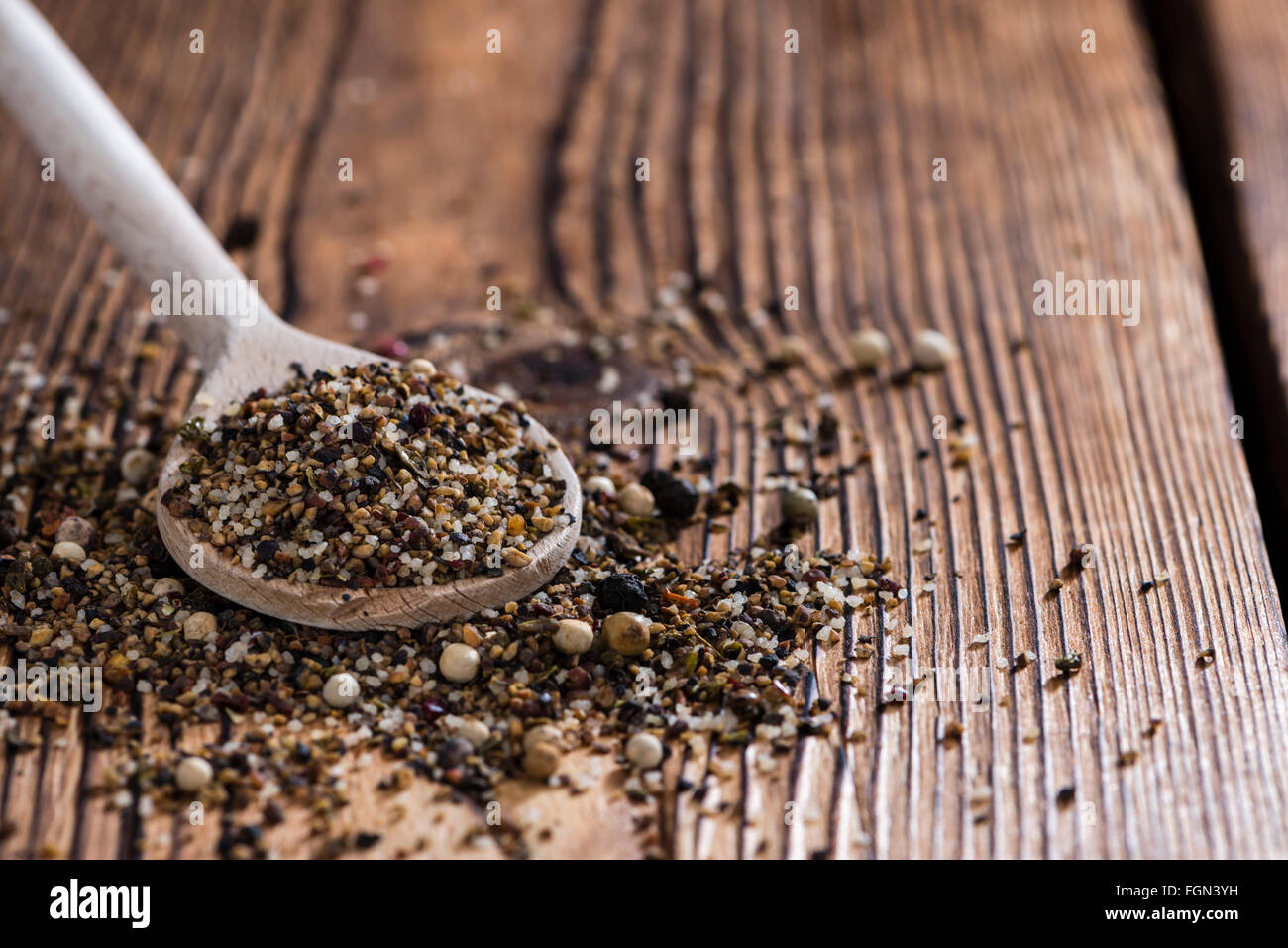 Crushed Peppercorns with different spices and salt (closeup shot Stock