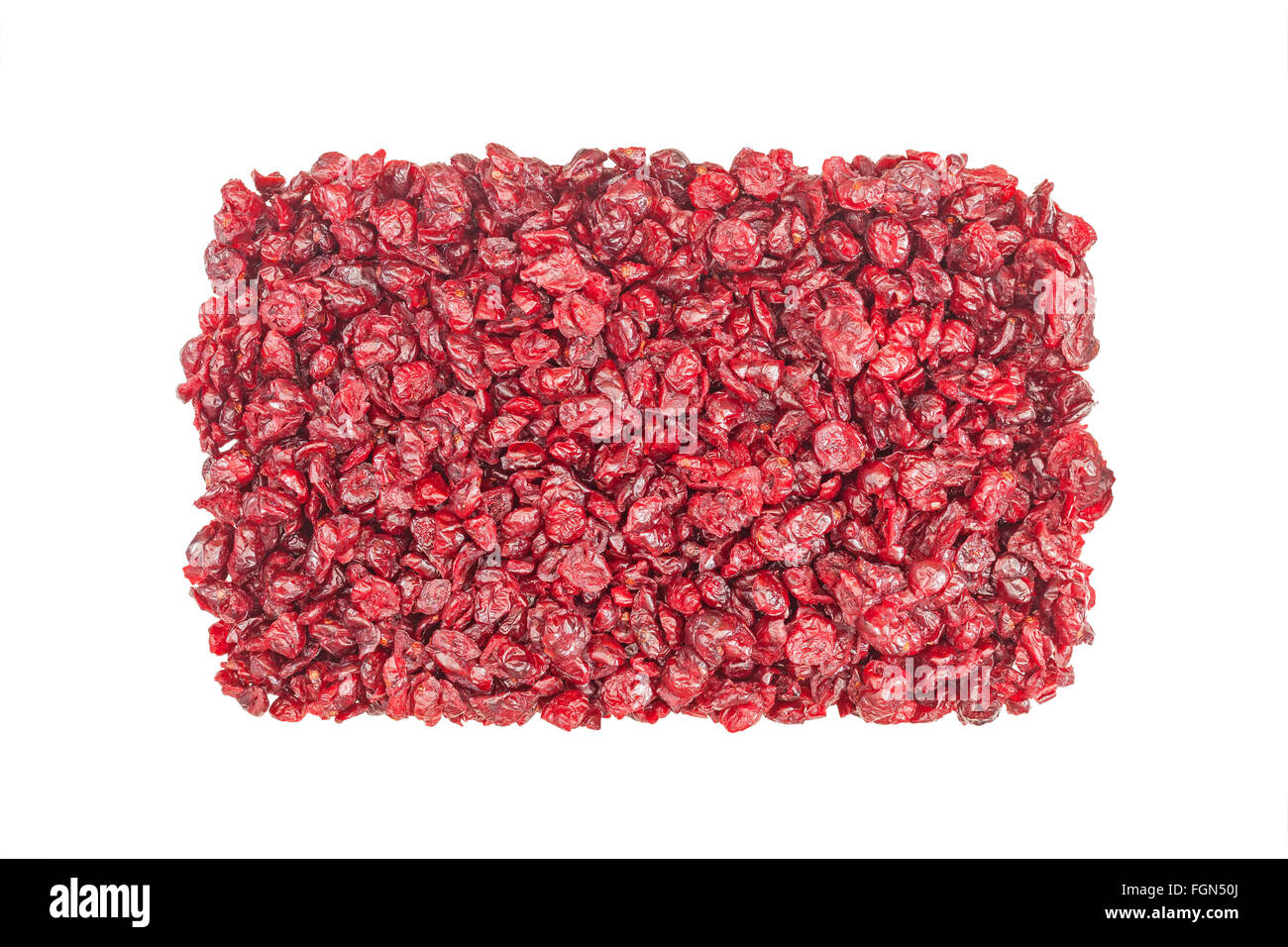 Cut cranberries isolated on white, food background. Stock Photo