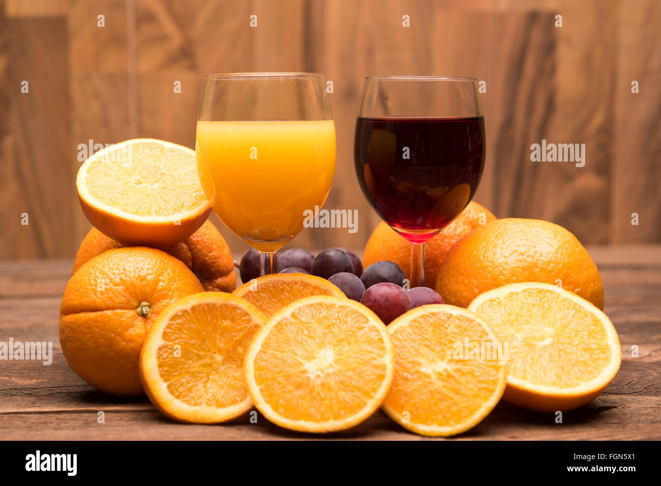 fresh orange and grape juice and fruits Stock Photo Alamy