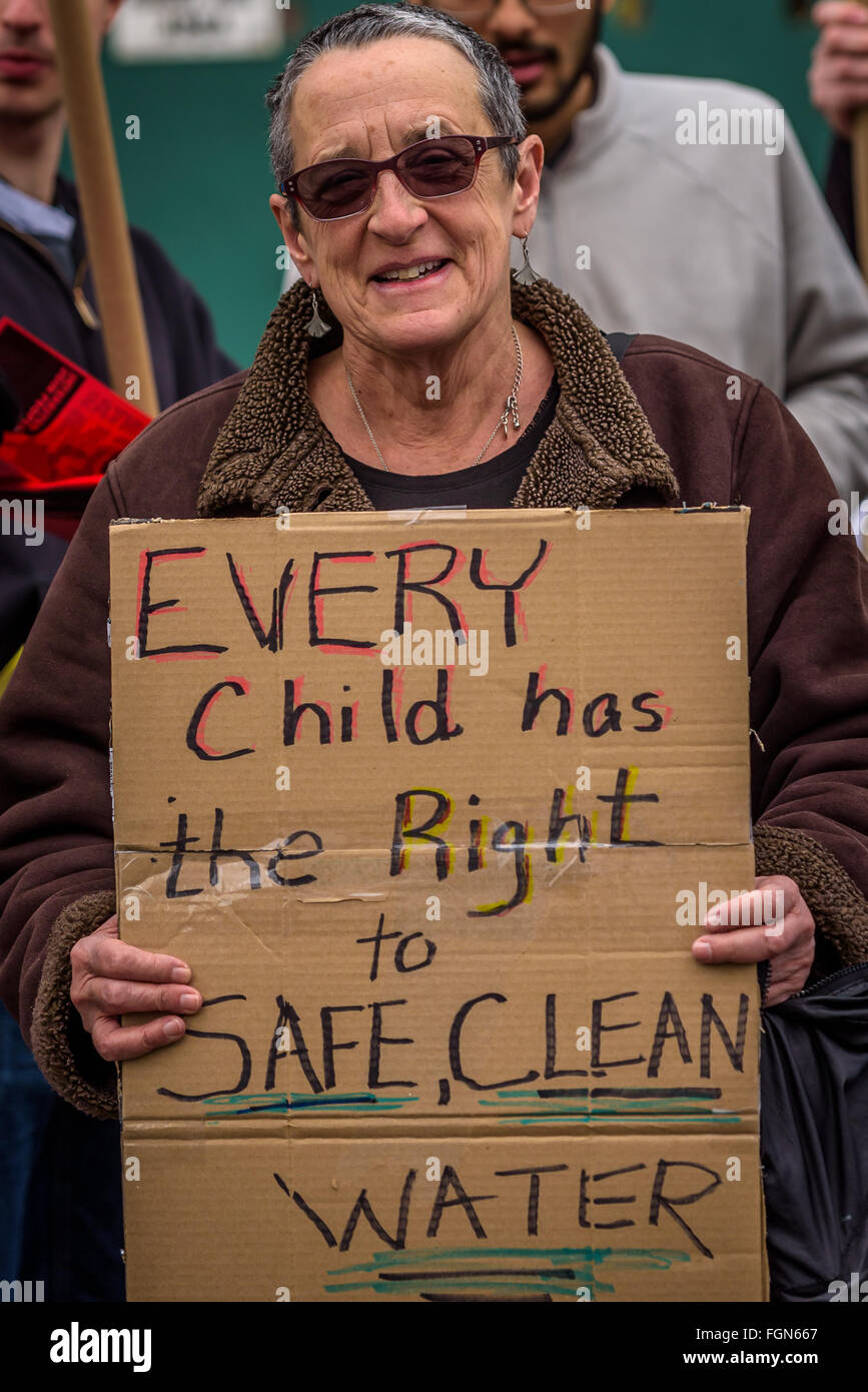 New York, United States. 21st Feb, 2016. NYC Solidarity Rally for Flint - A coalition of NYC Black Lives Matter activists and environmental justice groups marching on the 51st anniversary of the assassination of Malcolm X to demand justice for the people of Flint, Michigan. Credit:  Erik Mc Gregor/Pacific Press/Alamy Live News Stock Photo