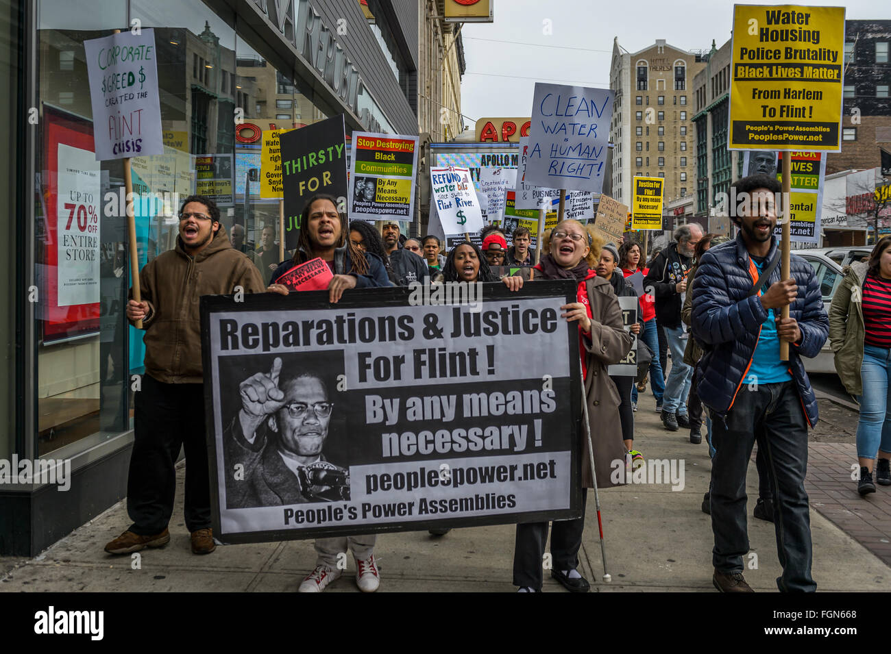 New York, United States. 21st Feb, 2016. NYC Solidarity Rally for Flint - A coalition of NYC Black Lives Matter activists and environmental justice groups marching on the 51st anniversary of the assassination of Malcolm X to demand justice for the people of Flint, Michigan. Credit:  Erik Mc Gregor/Pacific Press/Alamy Live News Stock Photo