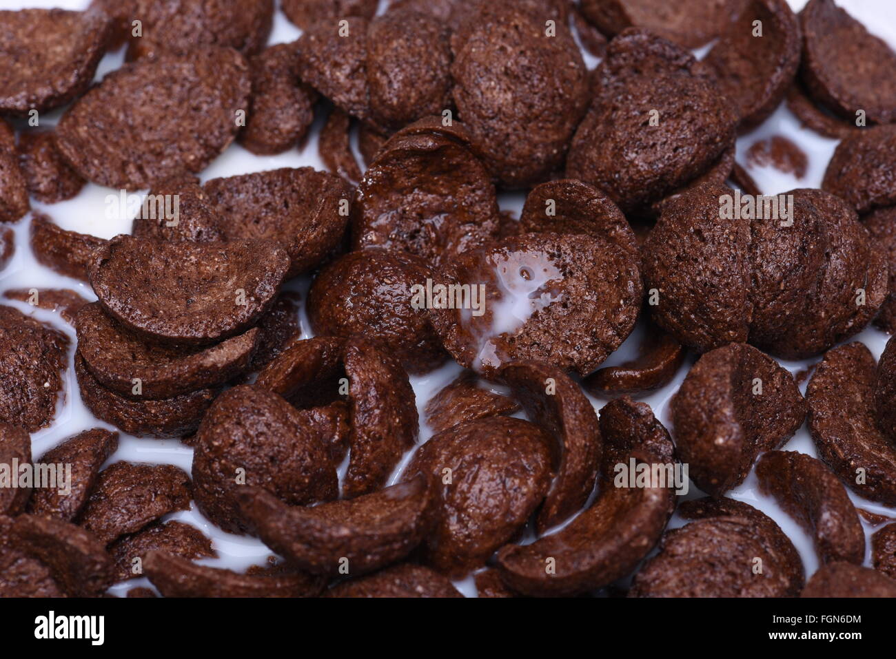 Chocolate cornflake cakes with milk Stock Photo Alamy