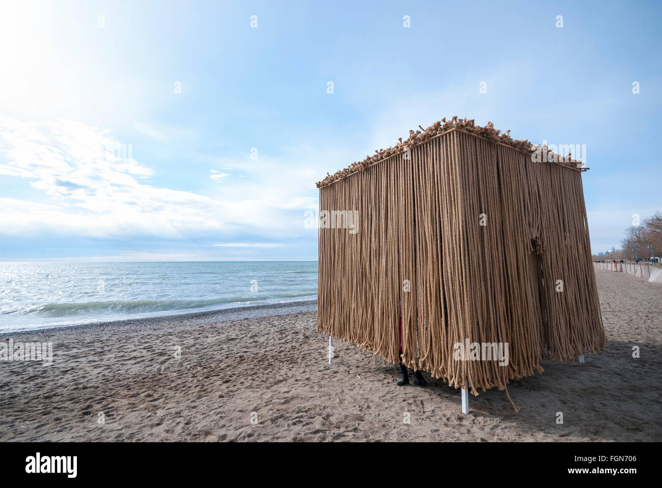 A lifeguard platform is used to create a sculpture entitled "Floating ropes" for a Toronto Beach winter art competition. Stock Photo