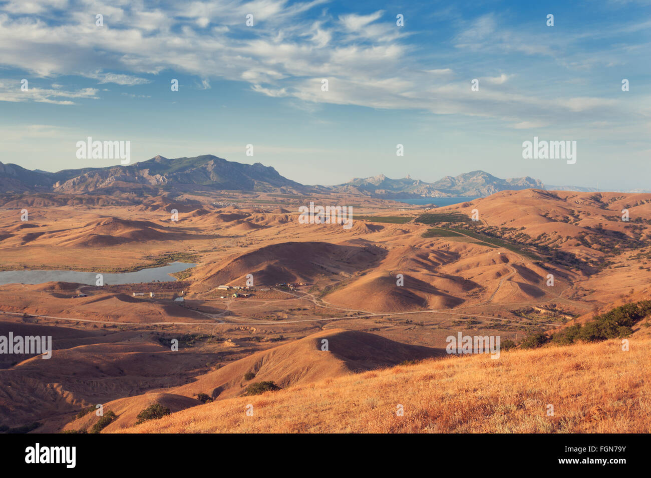 Beautiful view at the mountain valley with cloudy blue sky at sunset in ...