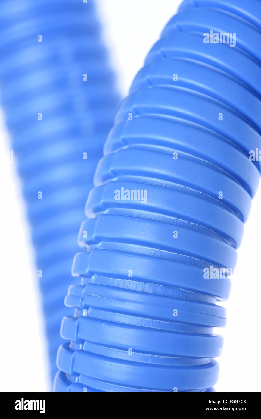 Plastic flexible corrugated pipe isolated on white background Stock Photo
