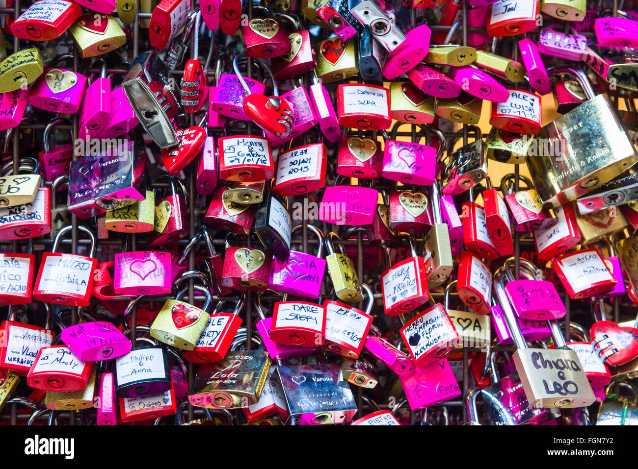 Love Padlocks in face of Juliet House in Verona, Italy, site of Romeo and Juliet Drama Stock Photo