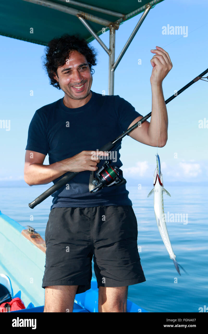 An Indian man sports fishing Stock Photo Alamy