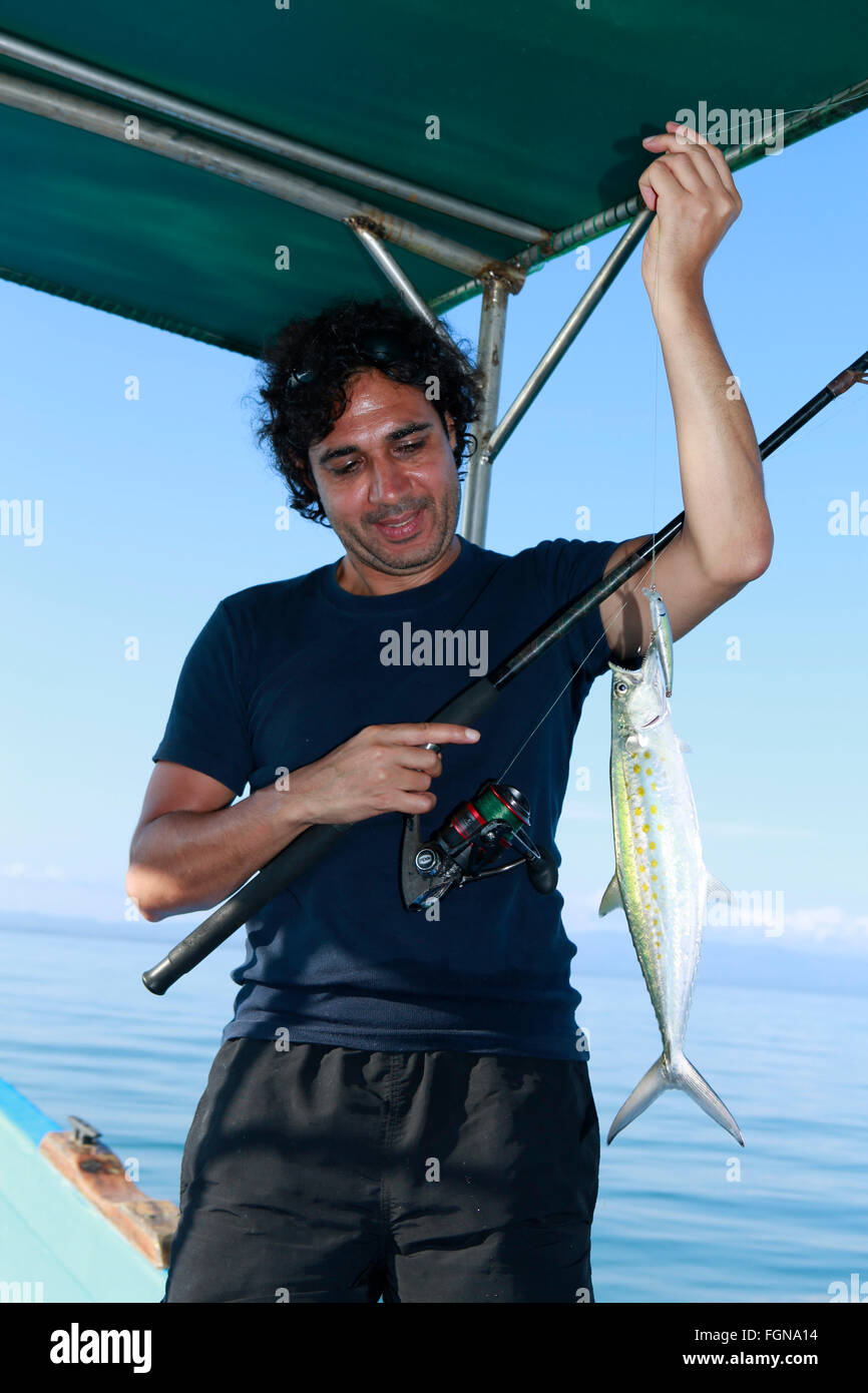 An Indian man sports fishing Stock Photo Alamy