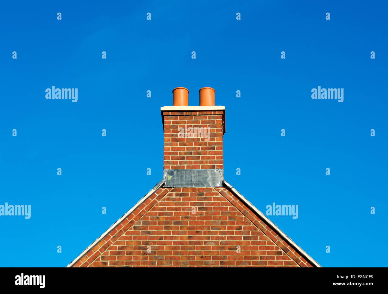 New house build red brick gable end and chimney abstract. Bicester, Oxfordshire, England Stock Photo