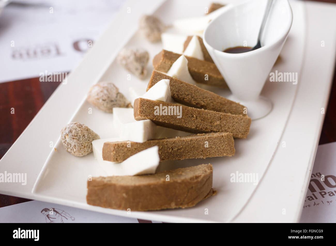 Gofio with soft cheese and fig, traditional canarian starter meal Stock Photo