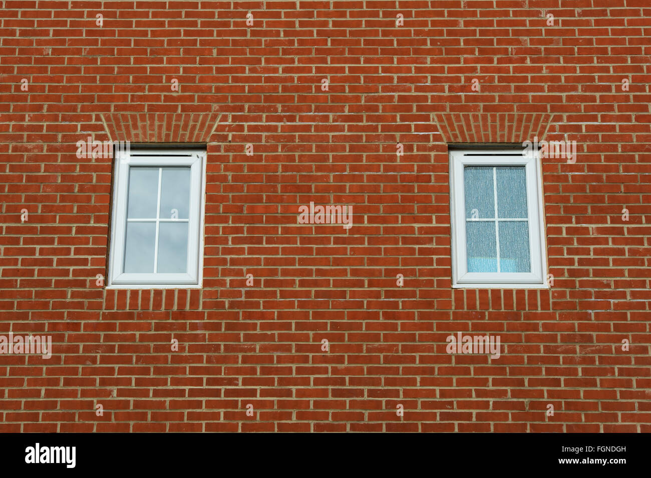 Two windows on a new house build. Bicester, Oxfordshire, England Stock