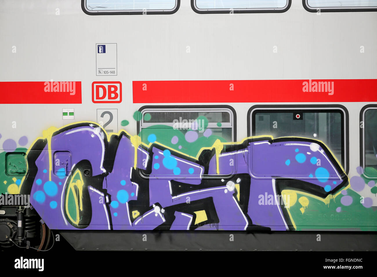 Leipzig, Germany. 19th Feb, 2016. A two-storeyed IC train with graffiti standing at the central station in Leipzig, Germany, 19 February 2016. The graffiti damage is yet another misfortune for the train model Intercity 2. PHOTO: JAN WOITAS/dpa/Alamy Live News Stock Photo