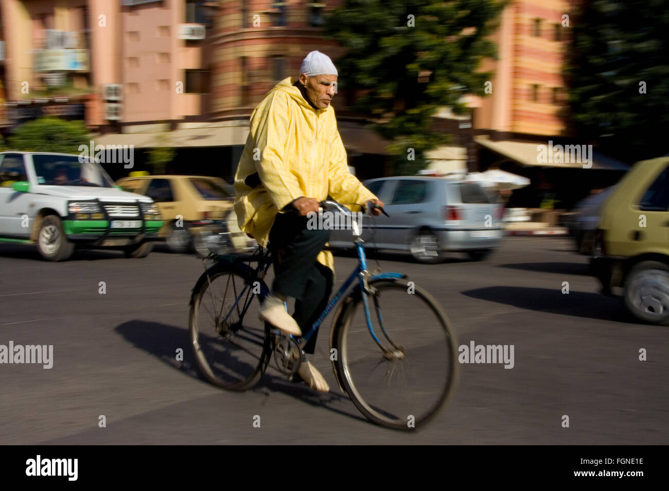 MARRAKECH, MOROCCO - JANUARY 21: unknown person biking on streets on January 21, 2010. With a population of over 900,000 inhabit Stock Photo