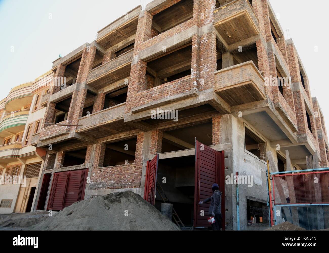 Kabul, Afghanistan. 21st Feb, 2016. An Afghan man works at a building ...