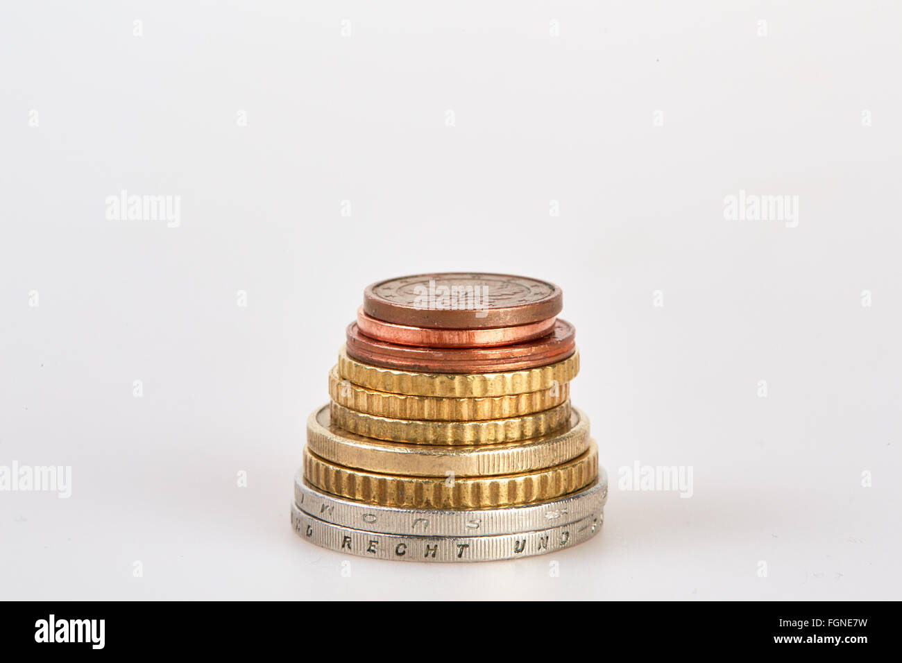 Stack of piled euro coins isolated on white background Stock Photo - Alamy
